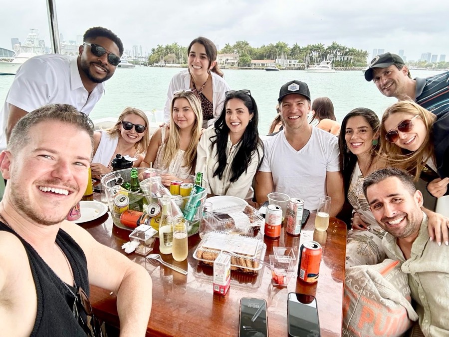 Ron Smith with friends from his faith community on a boat in Miami